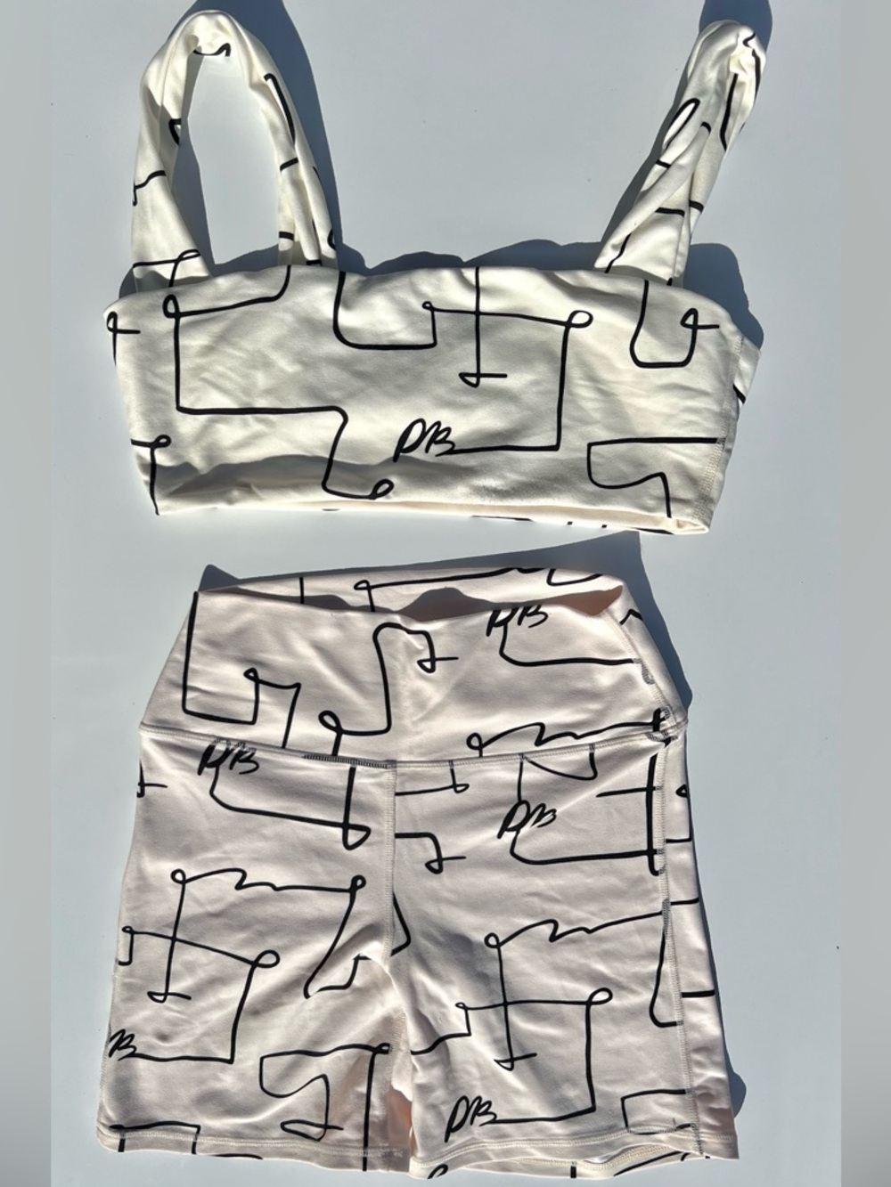 We Wore What Sports Bra And Biker Shorts Set Abstract White Black M/S